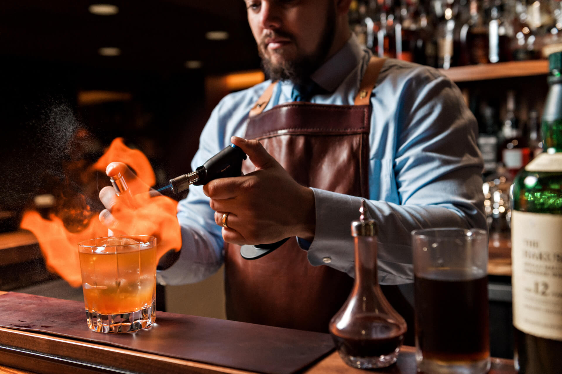 Cocktail preparation at Bar Leather Apron