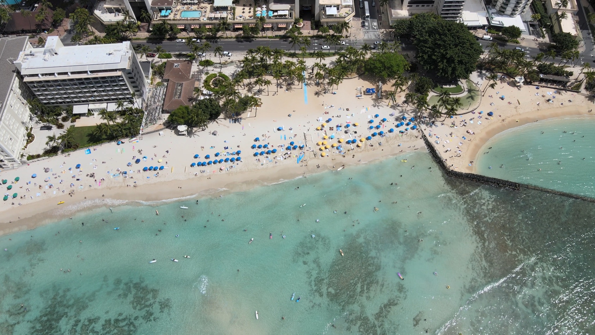 Aerial view of Kūhiō Beach and its breakwater in Waikīkī.