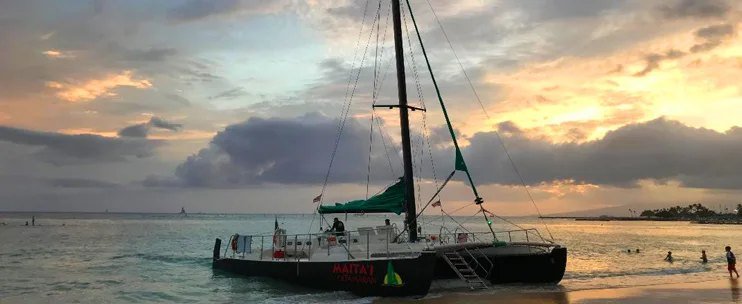 Maitaʻi Catamaran at sunset.