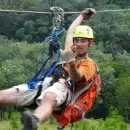 A visitor on Kualoa Ranch’s zipline.