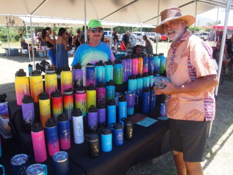 Vendors at the Kaunakakai Saturday Market in a documented Molokai Dispatch photograph.