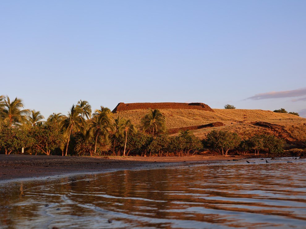 Heiau standing high above Pelekane Bay, as seen at sunset.