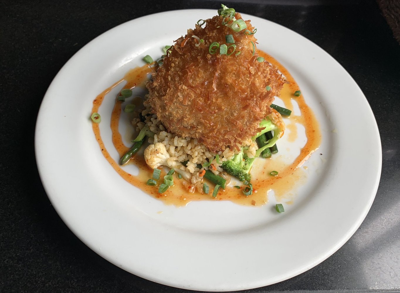 Coconut crusted fish — Kaleo’s official food photograph; branch not identified