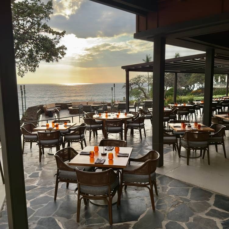 Manta oceanfront dining terrace at sunset; setting photograph, not breakfast buffet service
