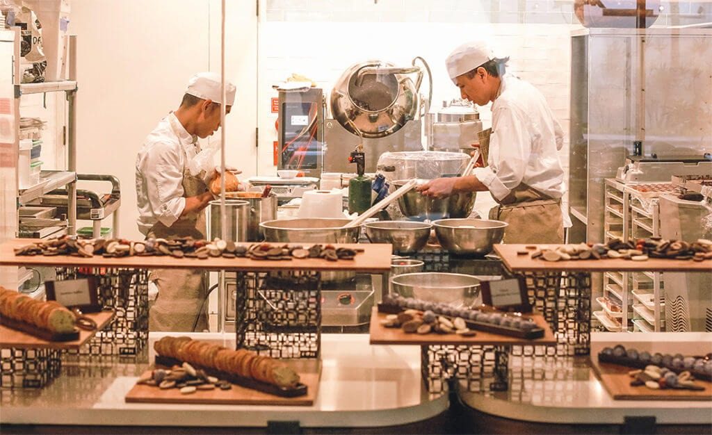 Halekulani Bakery counter and bakers at work