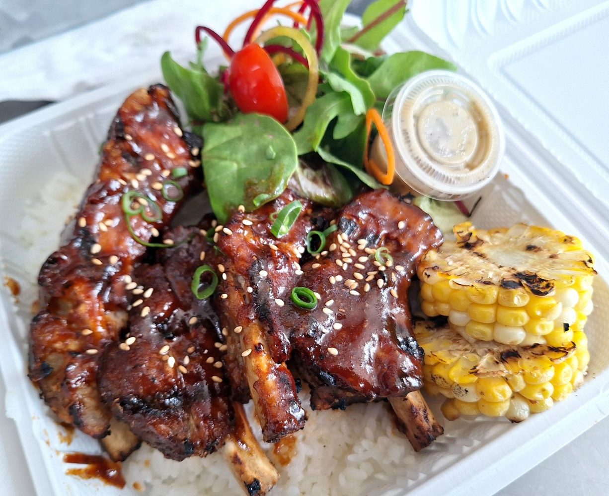 Baby back ribs and grilled corn at Kahai Street Kitchen