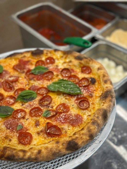Pepperoni pizza from Luigi’s Pizza at Paia Fishmarket Waikiki.