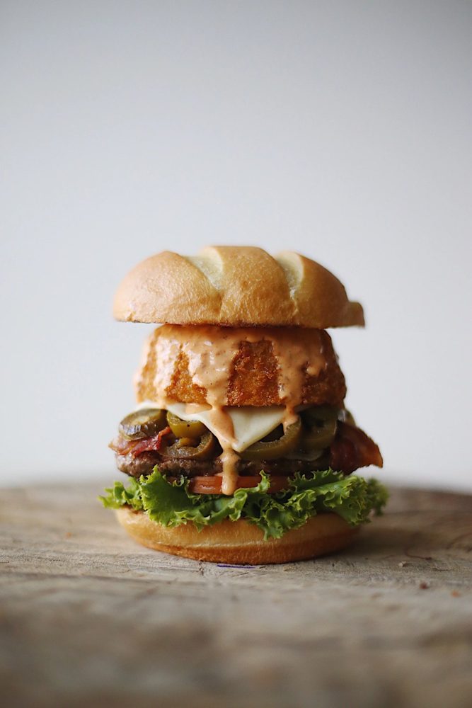 Seven Brothers burger; brand-level food photograph, not branch-specific