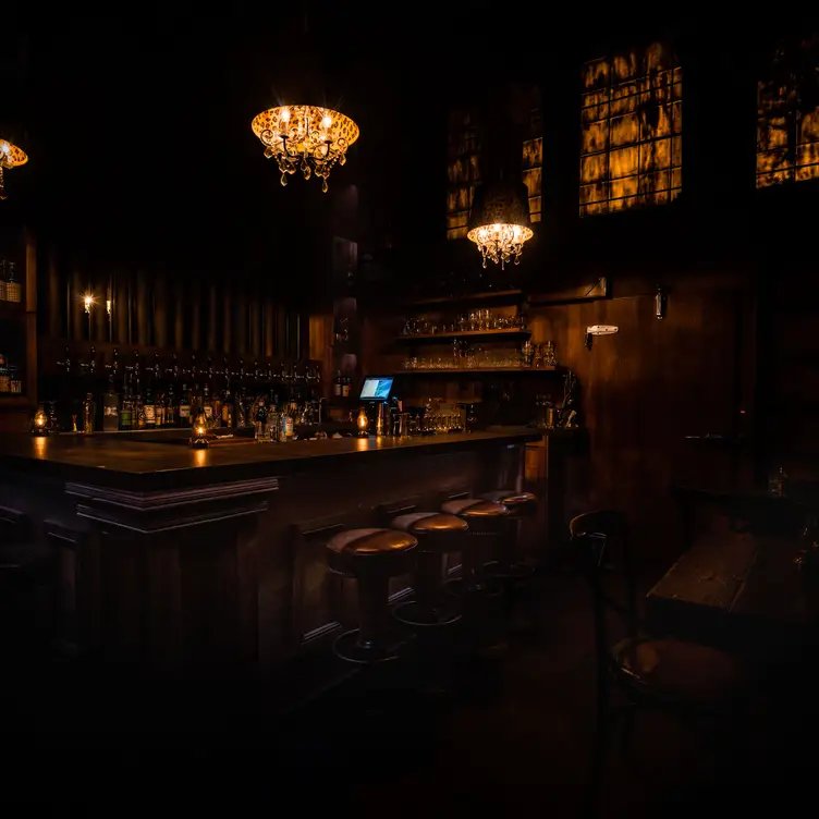 Gaslamp’s dimly lit bar and dining room in Kailua